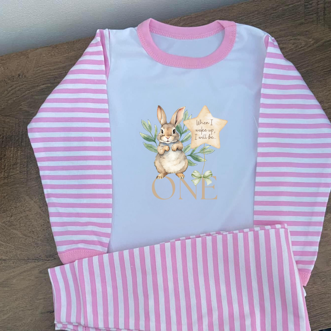 Pink when I wake up I'll be 2 with n image of a little bunny