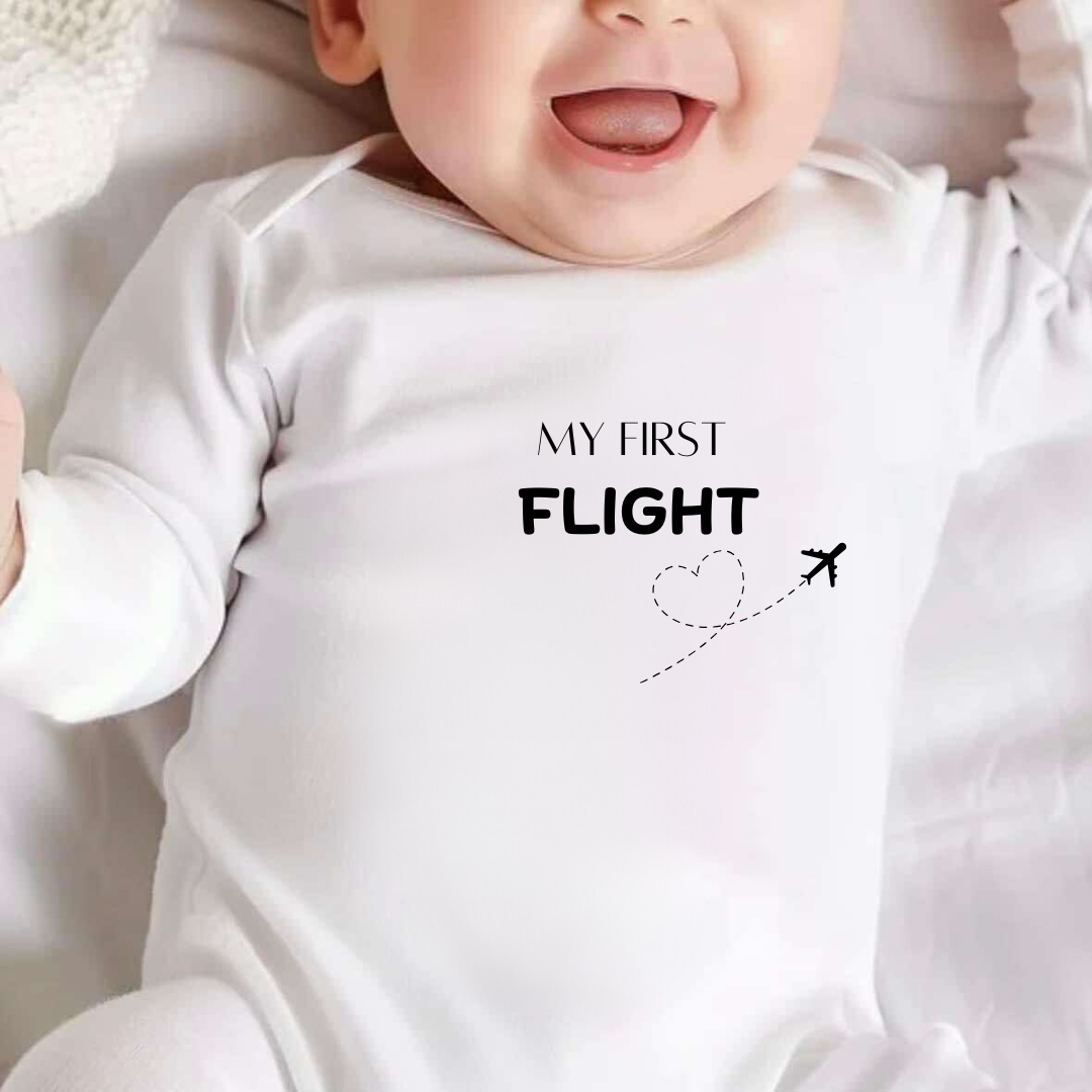 White baby vest with text 'My First Flight\'