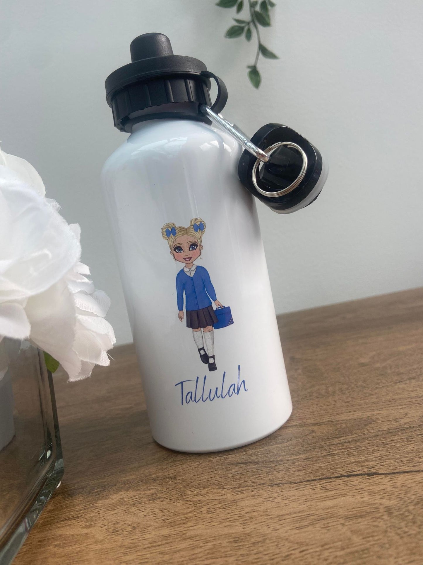 White water bottle with school doll design and name.