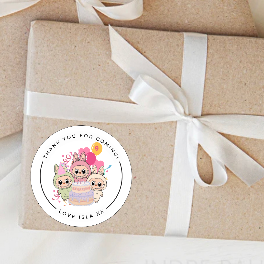 Gift wrapped in brown paper with a white ribbon and a personalised sticker on a light background