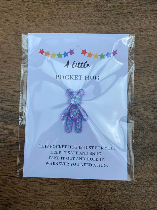 A pocket hug is a little piece of card with a colourful bear just for you to hold and hug when you need