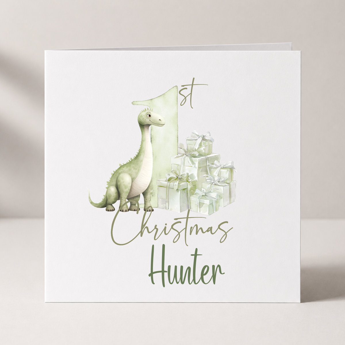 Dinosaur Baby's First Christmas Card with custom names and wording