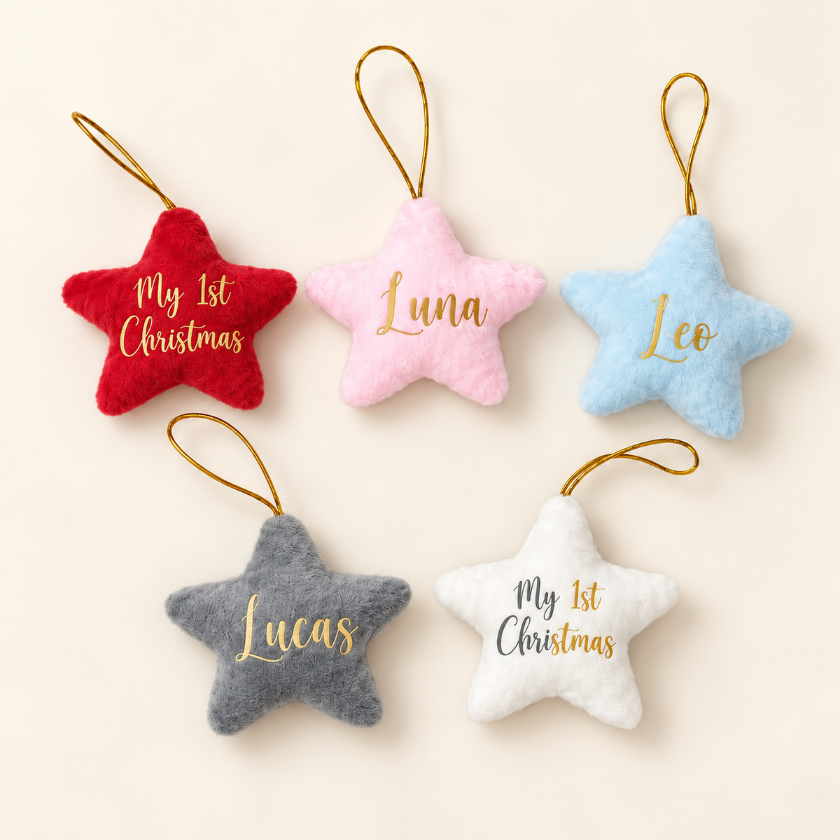 Five personalised plush star Christmas decorations in red, pink, blue, grey and white