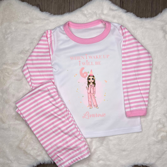Pink striped pyjamas with image of plousie doll and make up with personalised text 