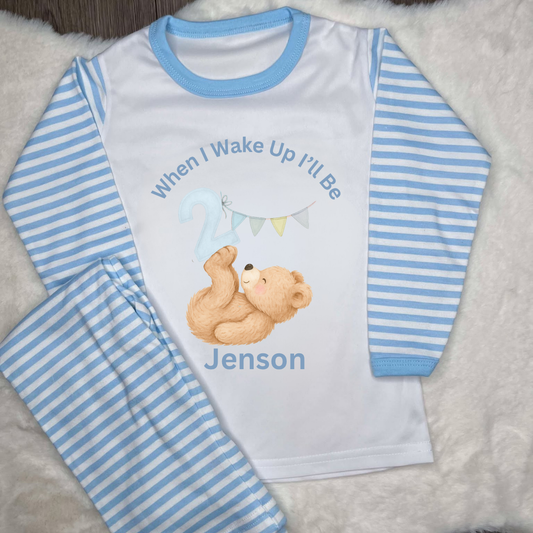 Blue  striped pyjamas with little bear with a blue  number 2 and bunting with personalised text 