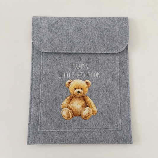 Grey personalised Little Red Book cover featuring the name Jessie and a teddy bear design.