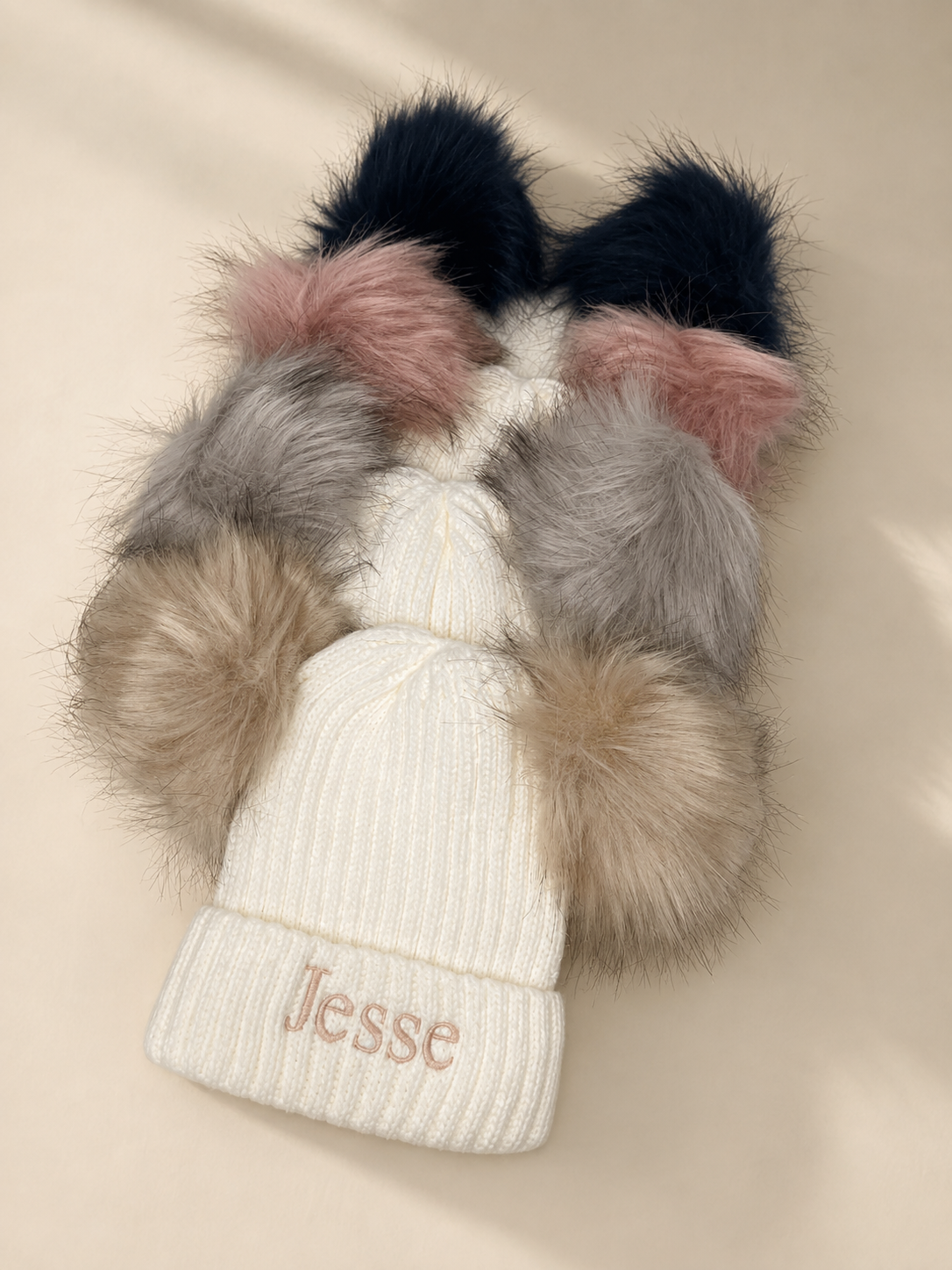 Knitted baby pom pom hats