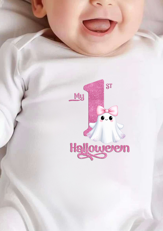 Baby wearing a white onesie with 'My 1st Halloween' design featuring a ghost and pink text.