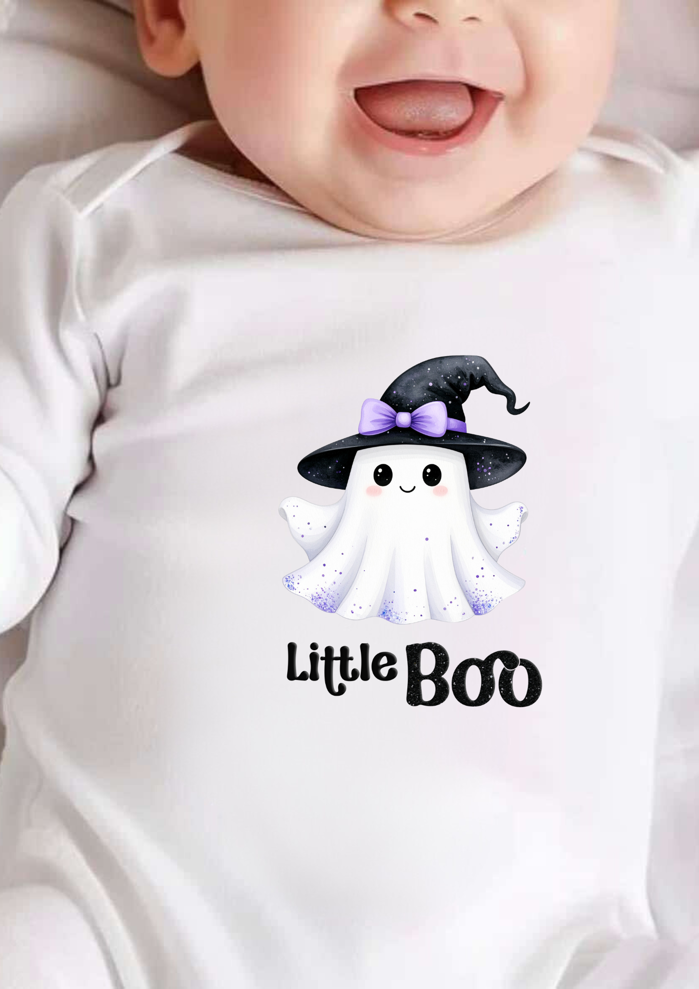 Baby wearing a Halloween-themed onesie with a ghost and 'Little Boo' text.