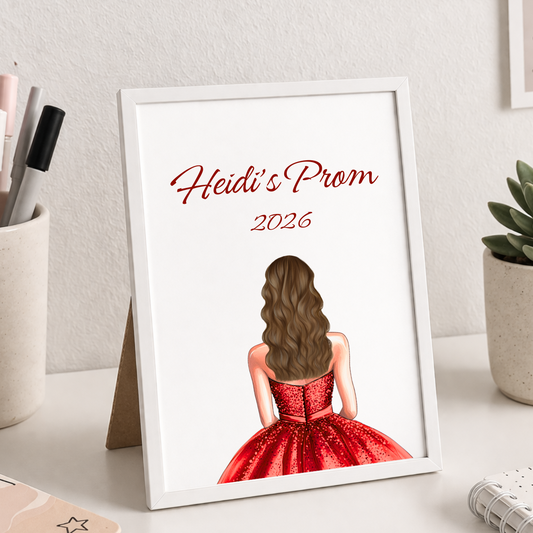 Framed print of a girl in a red dress with 'Heidi's Prom 2026' text on a desk.