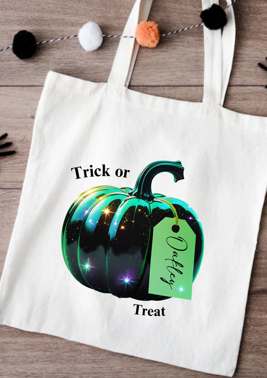 Tote bag with a Halloween-themed pumpkin design and text on a wooden surface.