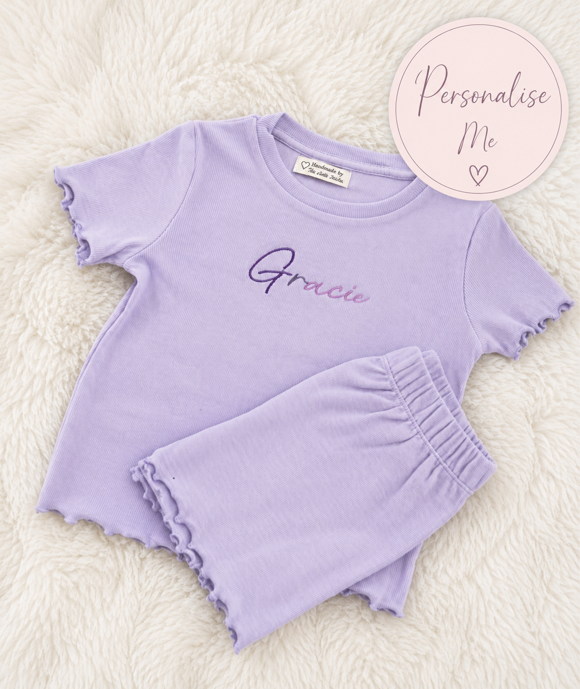 Purple children's outfit with 'Gracie' on a white background