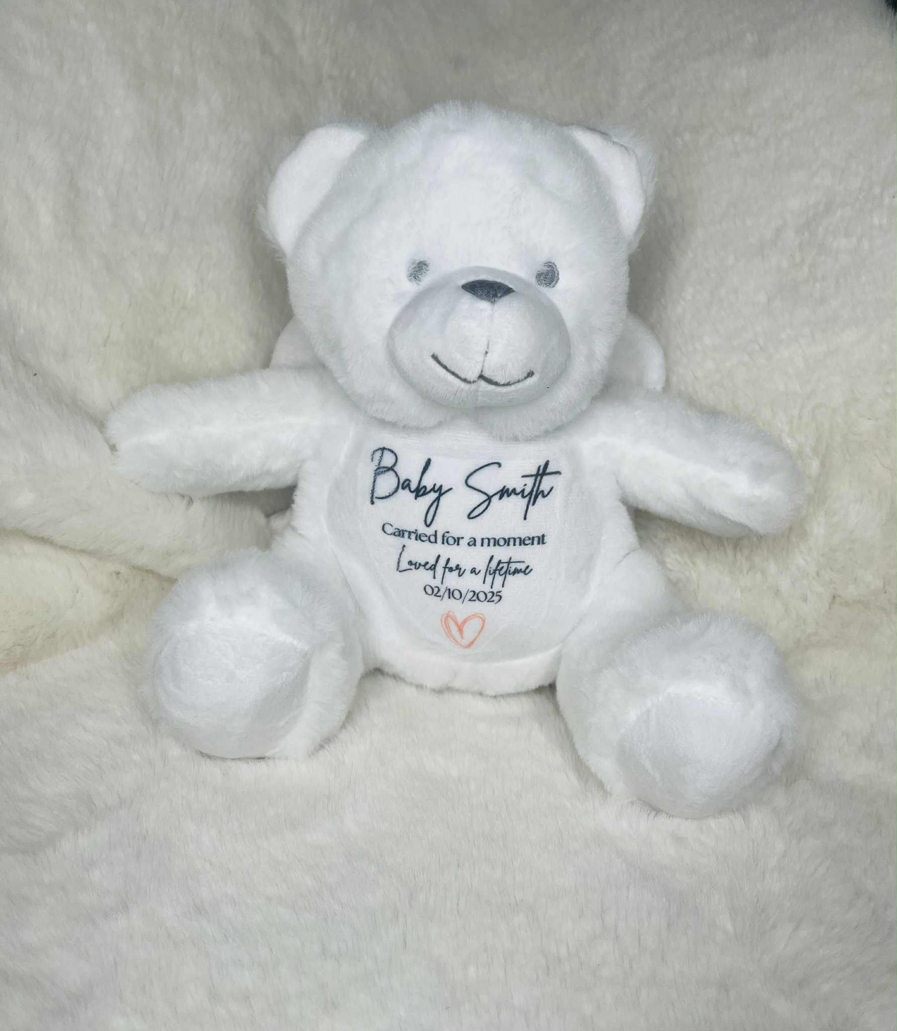 Personalised baby loss memorial teddy with baby’s name and “Carried for a moment, loved for a lifetime” message