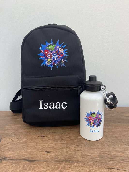 A black personalised mini backpack with a superhero design, a water bottle, and a name 'Issac' printed on the front.