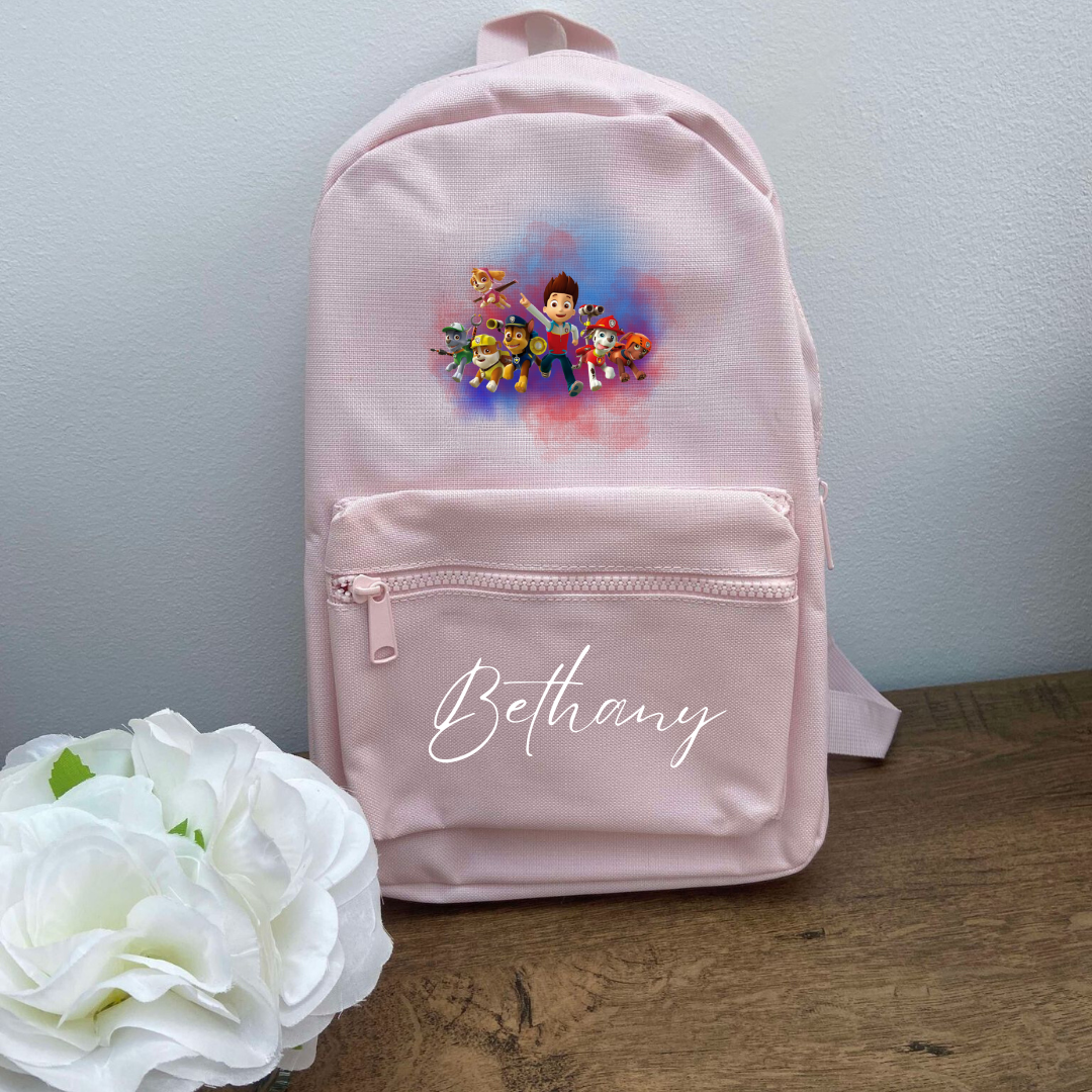Pink personalised backpack with paw patrol design and child's name