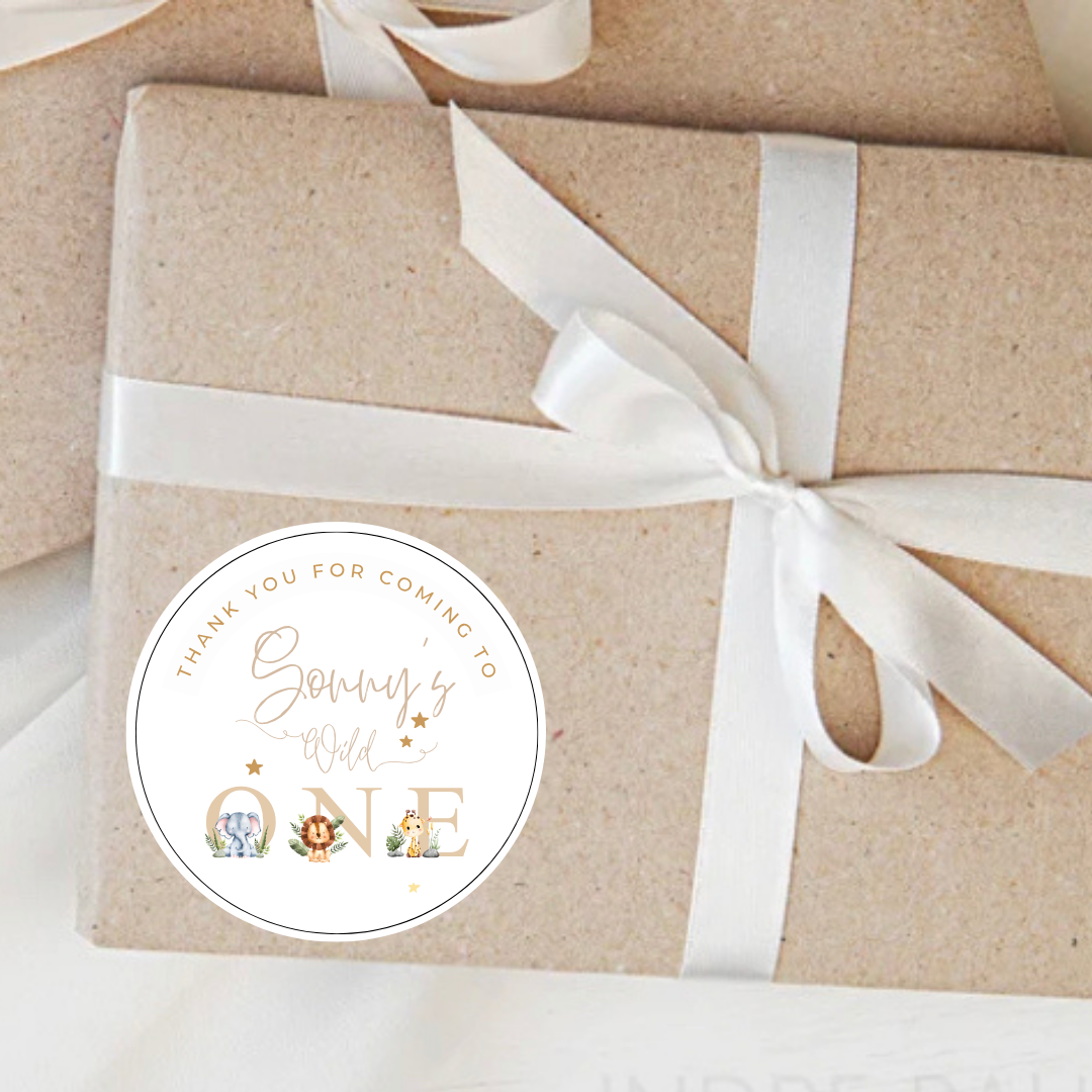 Gift wrapped in brown paper with a white ribbon and a personalized birthday sticker on a light background