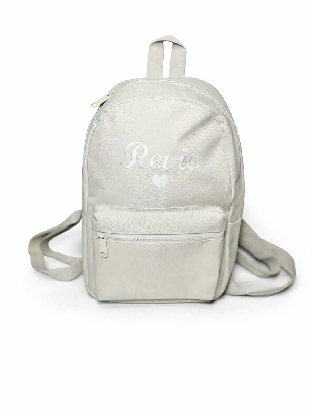 Light gray backpack with 'Reive' branding on a white background