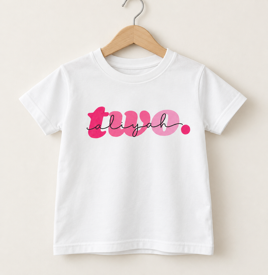 White personalised children’s second birthday T-shirt with pink number two and name Aaliyah