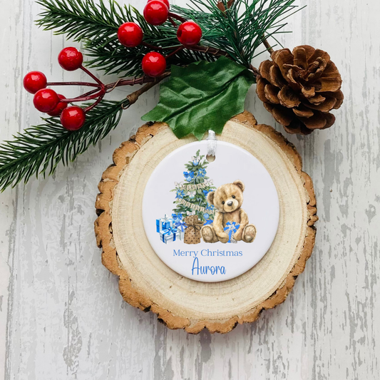 Personalised ceramic Christmas bauble with blue teddy and Christmas tree My First Christmas design