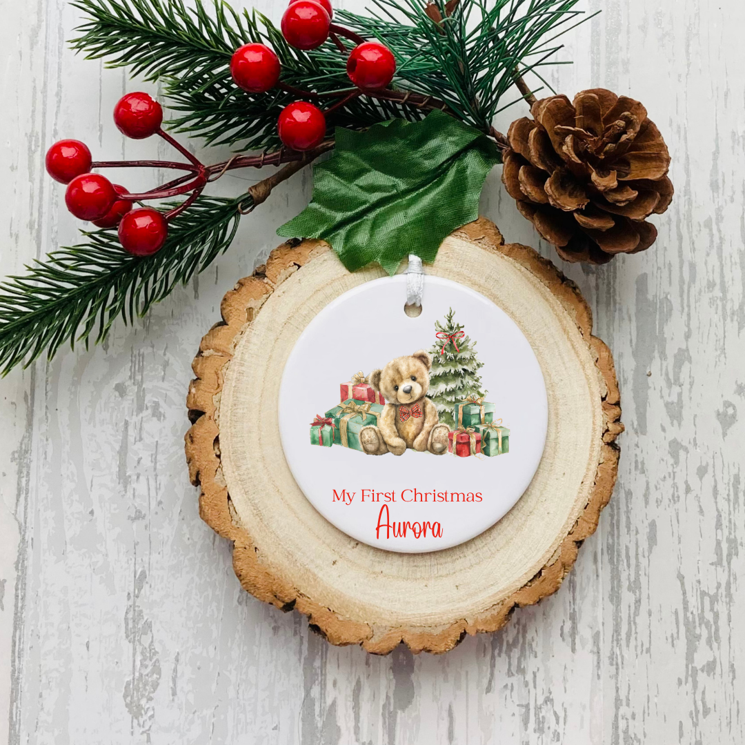 Personalised ceramic Christmas bauble with woodland animals, tree and My First Christmas wording