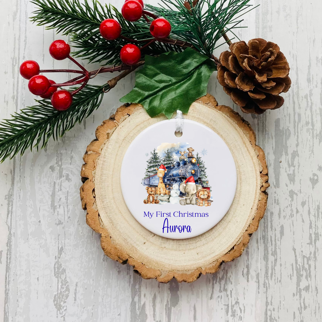 Personalised ceramic Christmas bauble with blue festive animal scene and My First Christmas wording