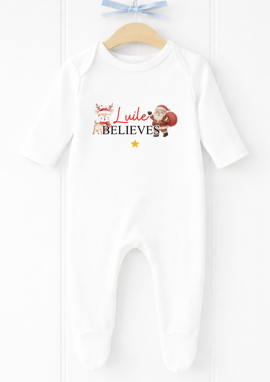 Personalised Santa believes Christmas baby sleepsuit and vest