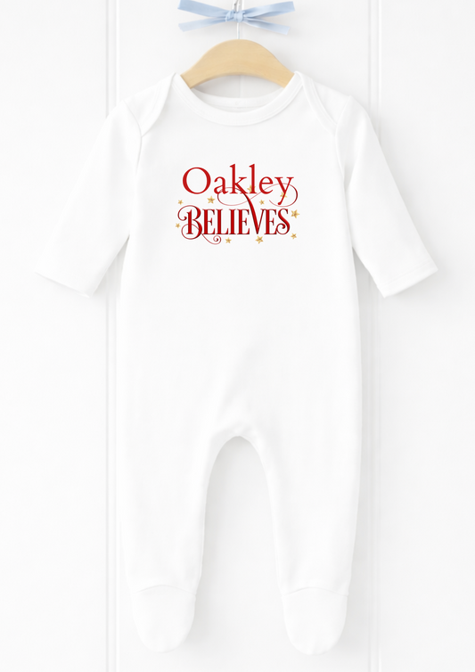 Personalised name believes Christmas baby sleepsuit and vest
