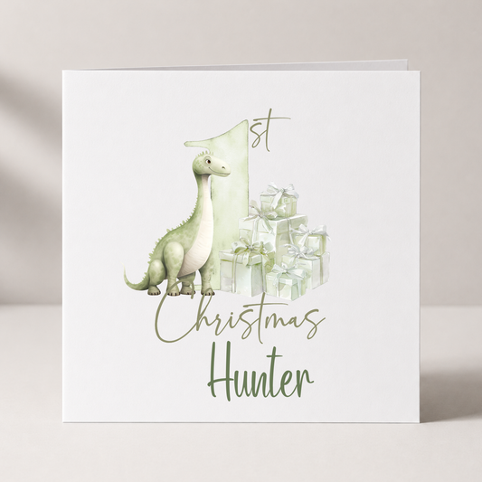 Dinosaur Baby's First Christmas Card with custom names and wording