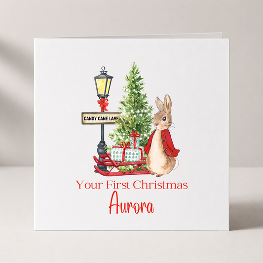 Peter Rabbit Baby's First Christmas Card with custom names and wording