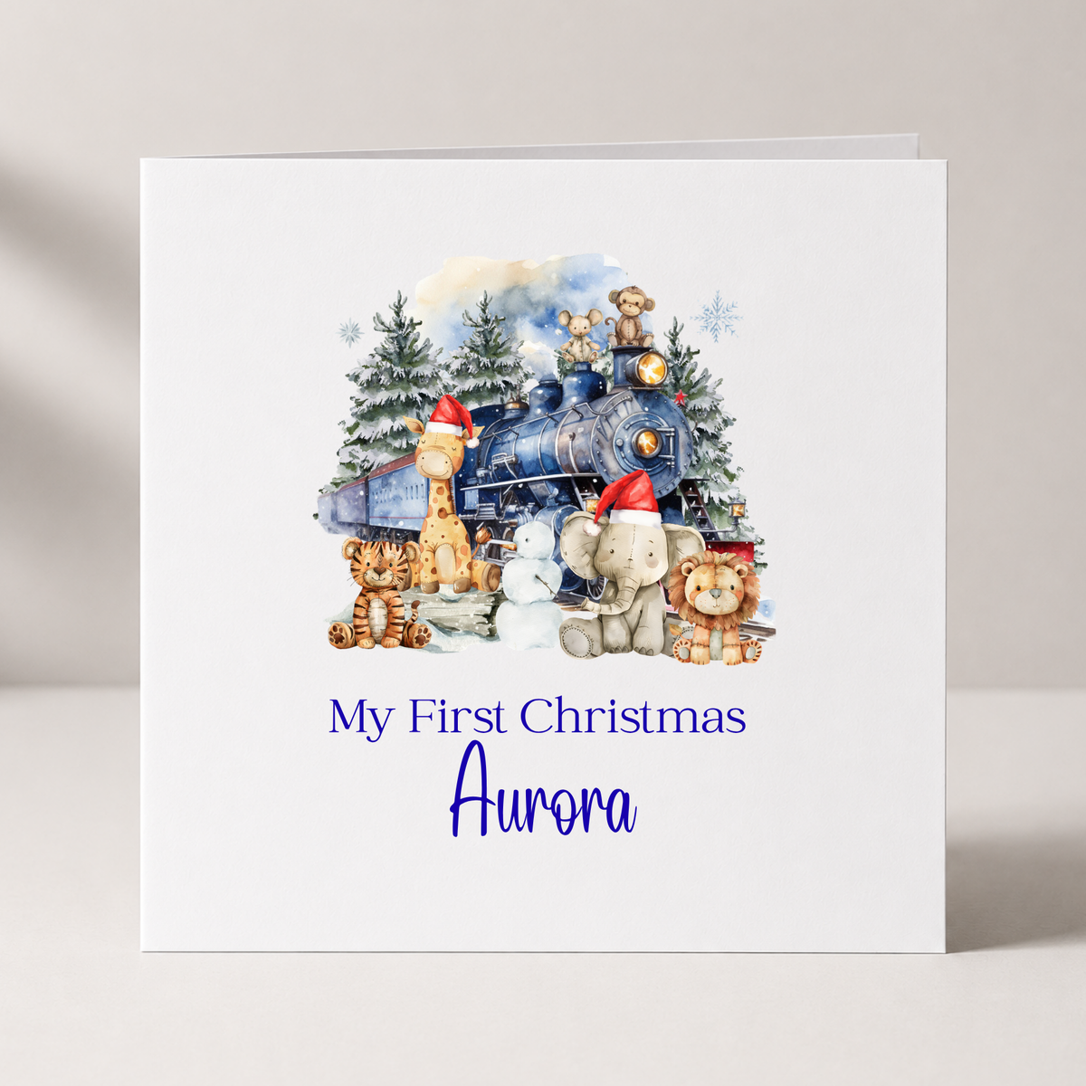 Blue Christmas Train Baby's First Christmas Card with custom names and wording
