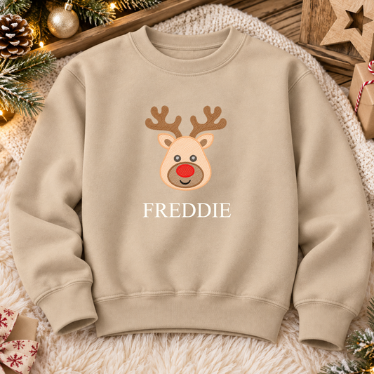 Nude personalised Christmas sweatshirt with an embroidered red-nosed reindeer