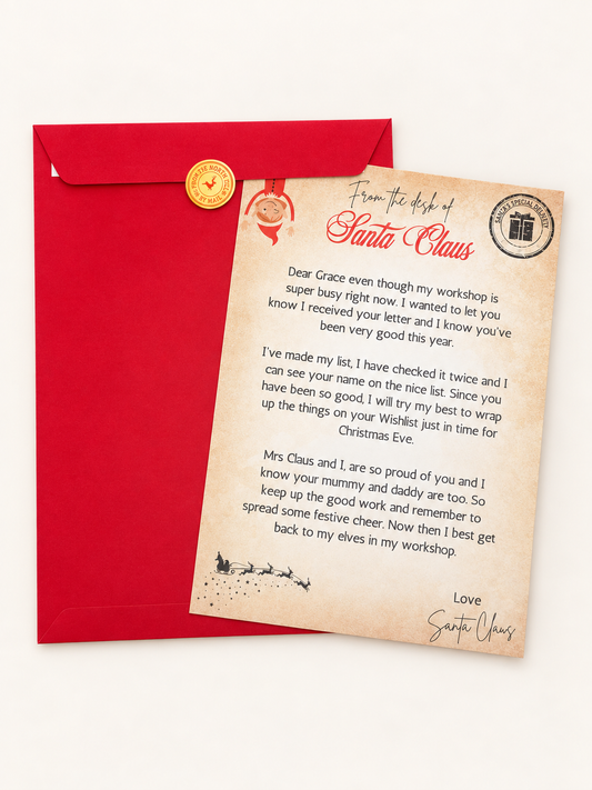 Personalised Letter From The North Pole with red envelope displayed on a clean cream background