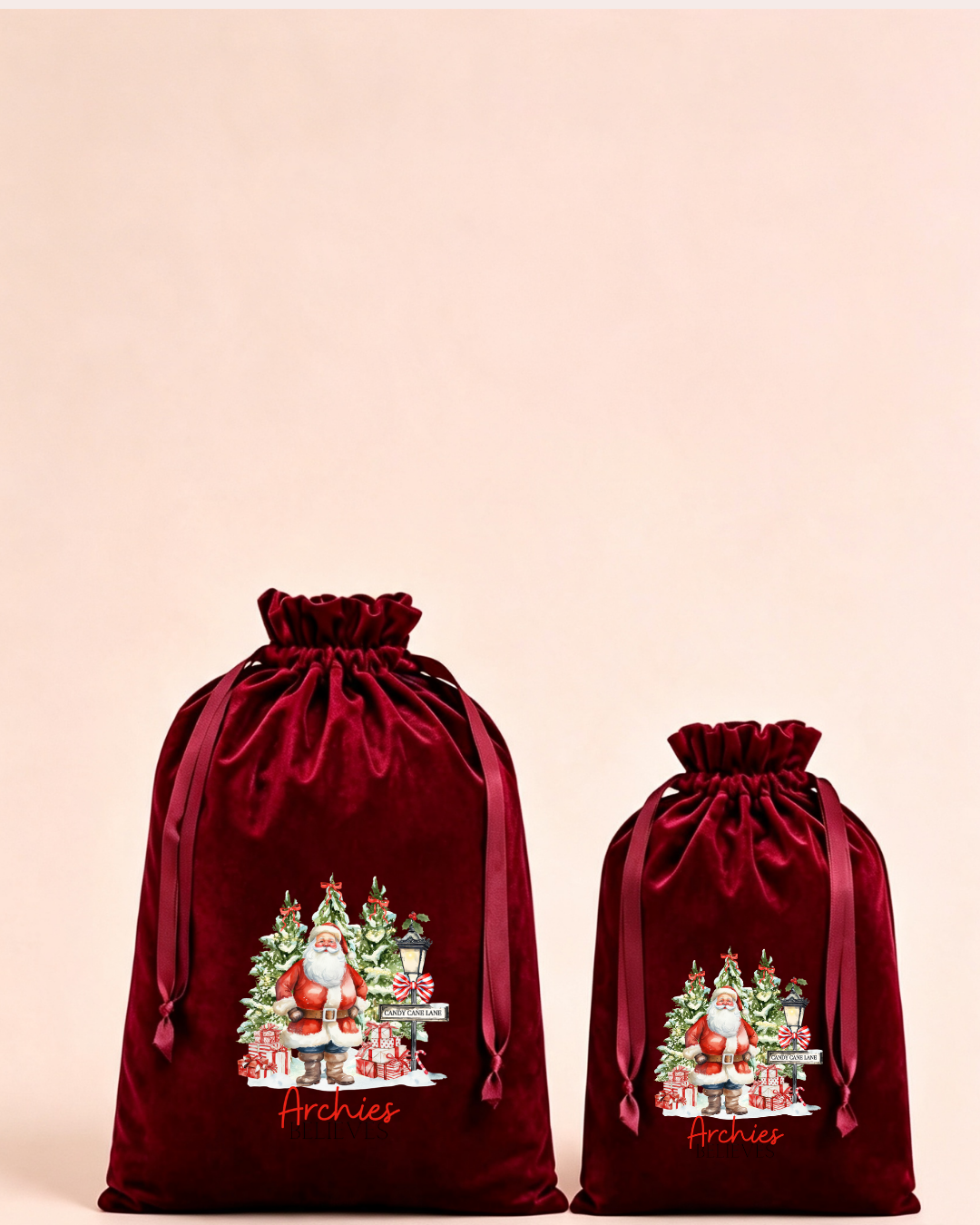 Personalised red velvet Christmas sack in medium and large with festive Christmas gnomes
