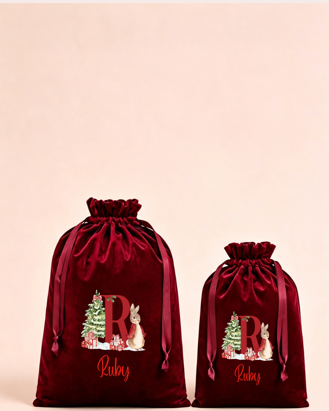 Personalised red velvet Christmas sack in medium and large with festive initial and woodland animals