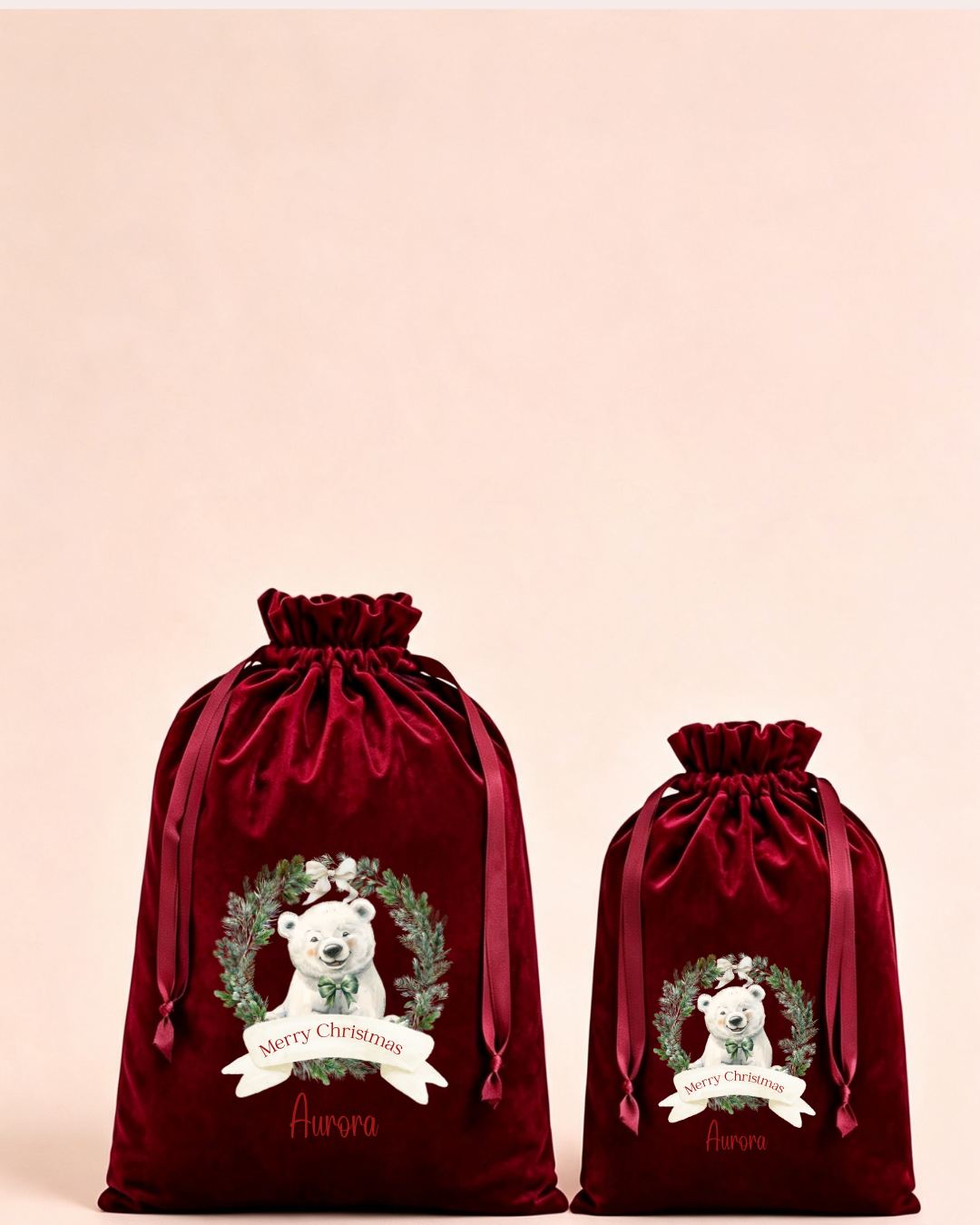 Personalised red velvet Christmas sack in medium and large with polar bear Christmas wreath
