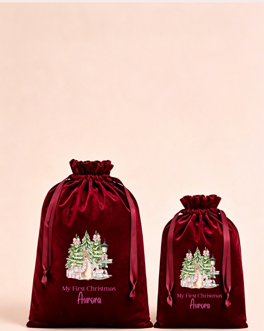 Personalised red velvet Christmas sack in medium and large with watercolour Christmas trees