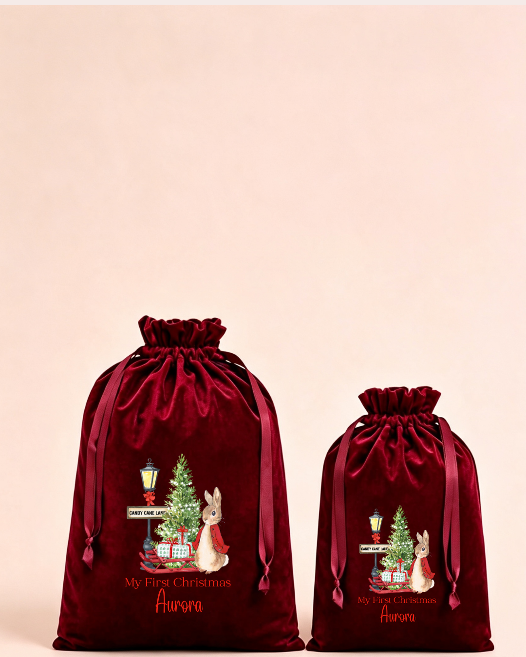 Personalised red velvet Christmas sack in medium and large with woodland animals around a Christmas tree