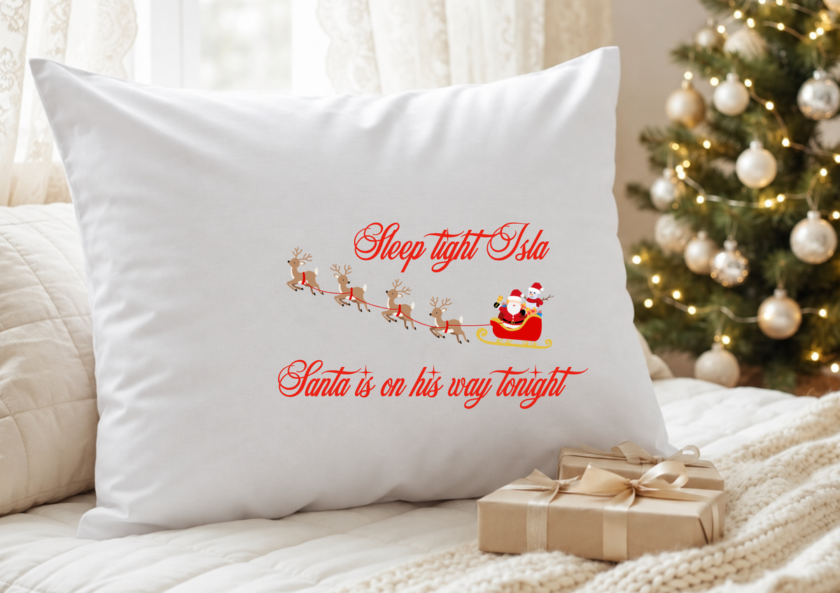 Personalised Christmas pillowcase with Sleep Tight and Santa is on his way tonight wording
