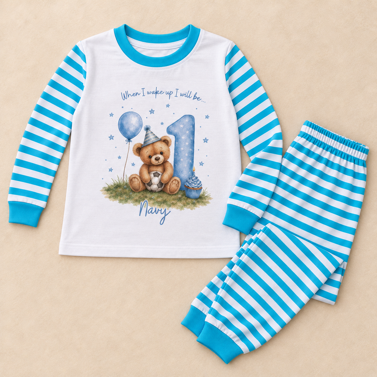Personalised blue striped children’s birthday pyjamas with teddy bear, age and name